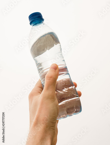 Water bottle in hand