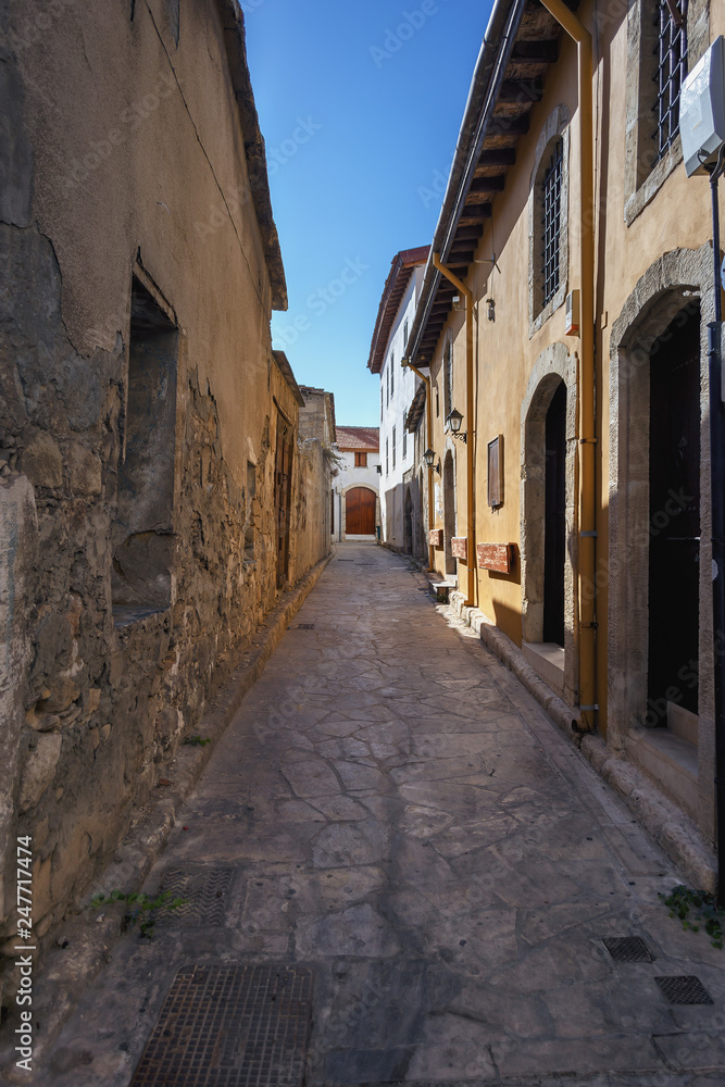 narrow stone-paved street in the old part of the Greek city of Limassol