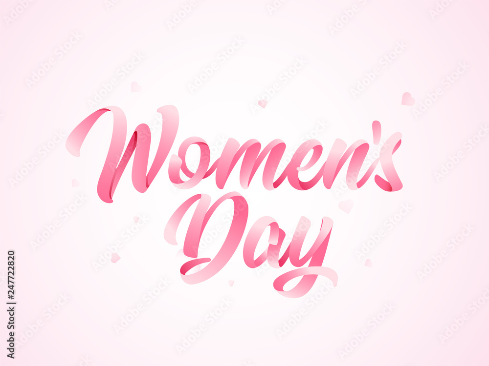 Calligraphy of Women Day text on pink background.