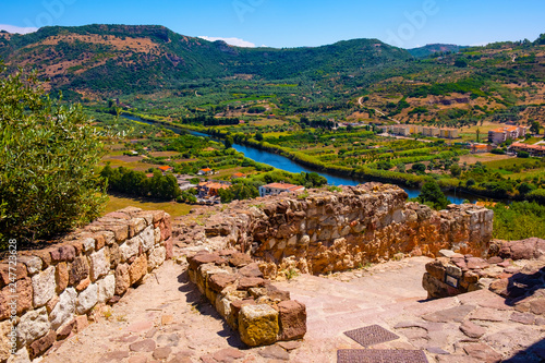 Φωτογραφία Sardinia, Italy - Panoramic view of the town of Bosa by the Temo river and surro