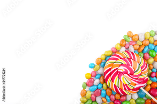 Colorful lollipops and different colored round candy isolated