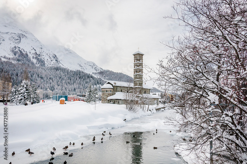 St. Moritz, St. Moritzersee, Kirche, St. Karl Borromäus, Inn, Fluss, Eisfläche, Oberengadin, Winter, Winterwanderweg, Graubünden, Alpen, Schweiz photo