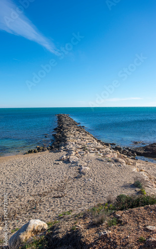 Breakwater on a beach of the sea blister  Costa daurada