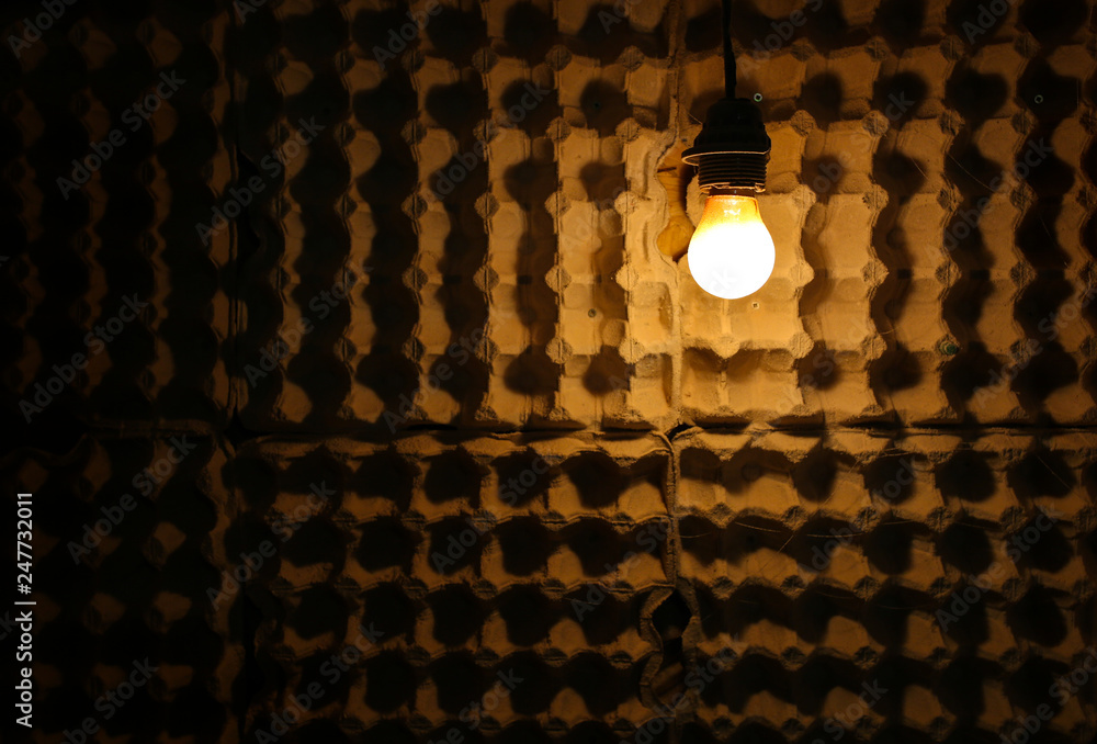 Loft design with a bulb lightning. Cardboard paper natural background texture. Interior decision. Loft design with a bulb lightning. Cardboard paper natural background texture. Interior decision.