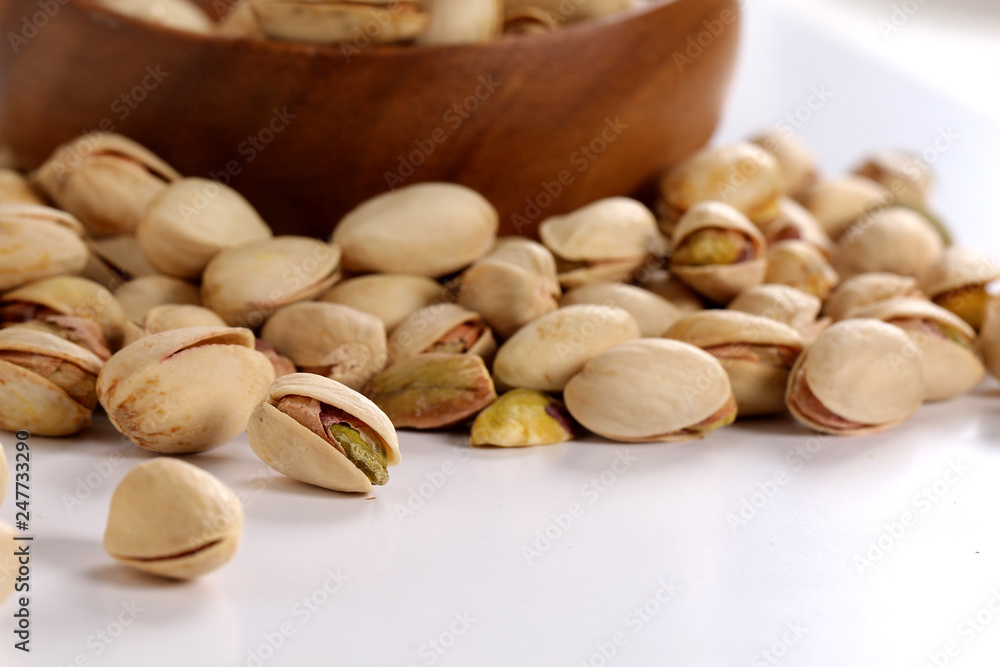 pistachios on a white background pistachios on a white background