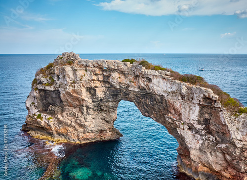 Es Pontas, a natural rock arch at Mallorca coast, Spain.