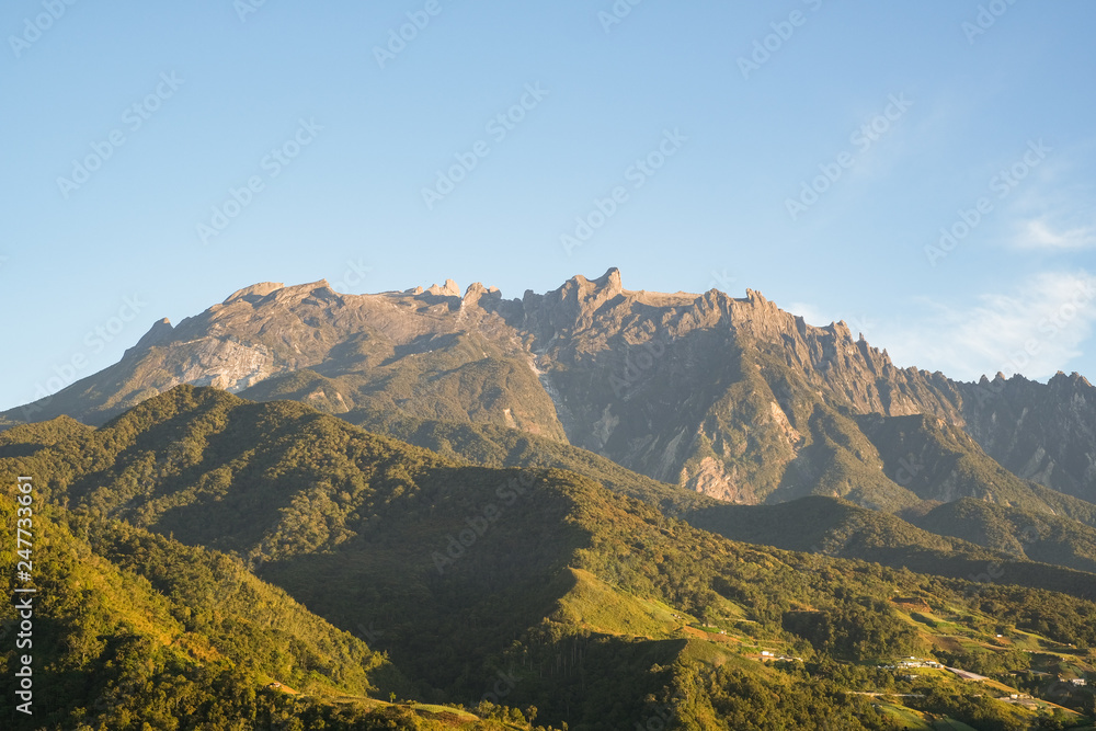 The scenery of Mount Kinabalu shot from nearby Kundasang town during day time.