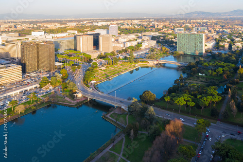 Aerial view of the modern EUR district in Rome, built for the Universal Exposition that should have been held in the Capital in 1942. In the foreground the small lake and the neighborhood park © Stefano Tammaro