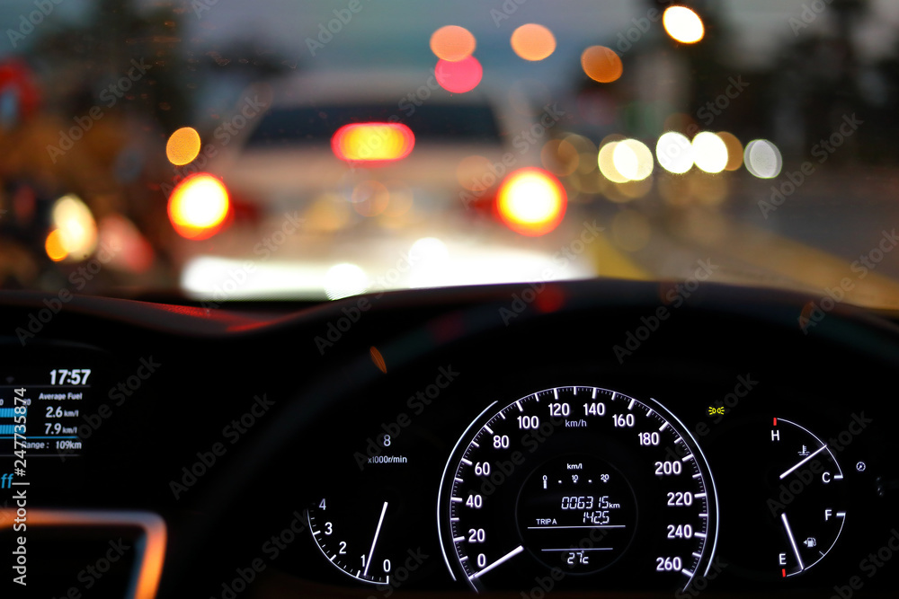 speedometer in modern vehicle car drive travel road trip in night city