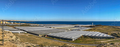 Panoramic view of greenhouse plantations in Almeria, southern Spain, next to the Mediterranean sea.