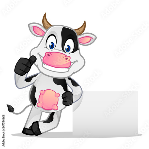 Cow leaning on white sign