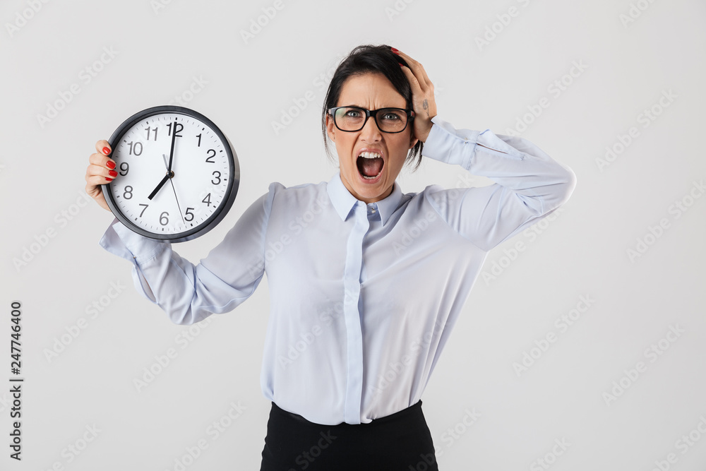 Shocked businesswoman smartly dressed standing Shocked businesswoman smartly dressed standing