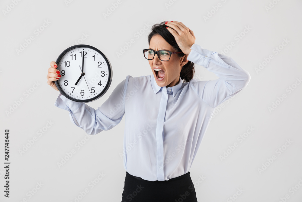 Shocked businesswoman smartly dressed standing Shocked businesswoman smartly dressed standing