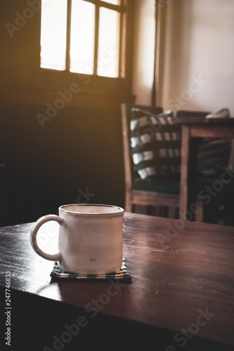 Fototapeta Naklejka Na Ścianę i Meble -  coffee cup on wooden table