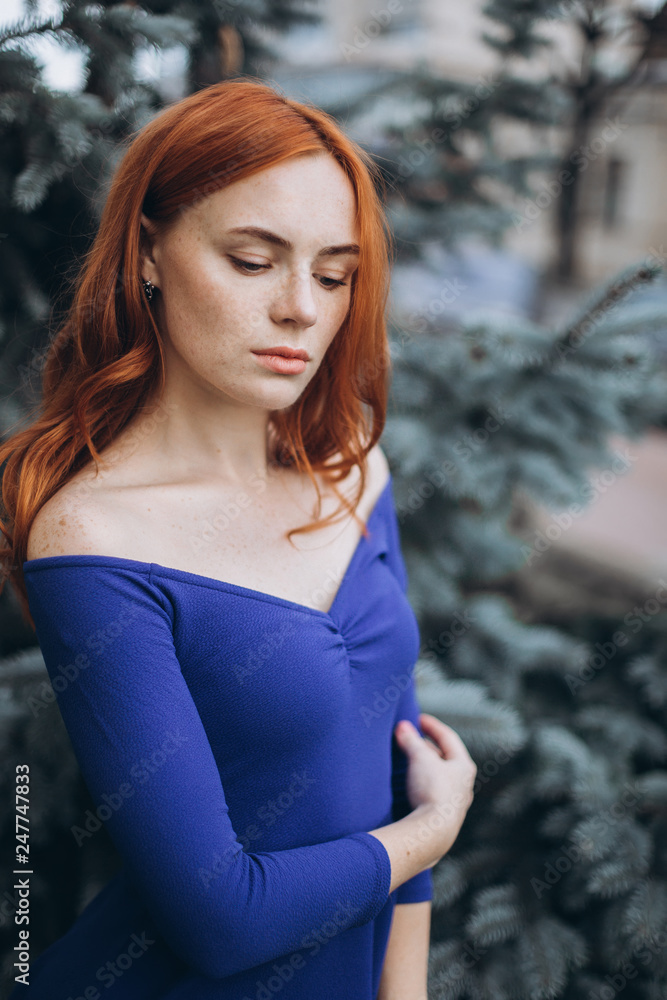Portrait of gorgeous natural luxury glamour sexy lady outdoors in blue dress Portrait of gorgeous natural luxury glamour sexy lady outdoors in blue dress