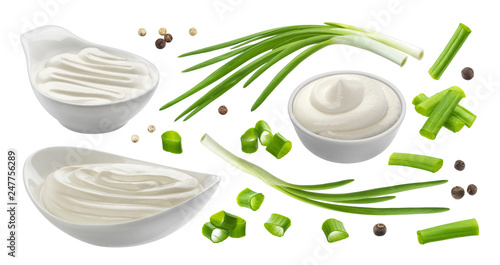 Sour cream and chives isolated on white background, green onion with sour cream sauce