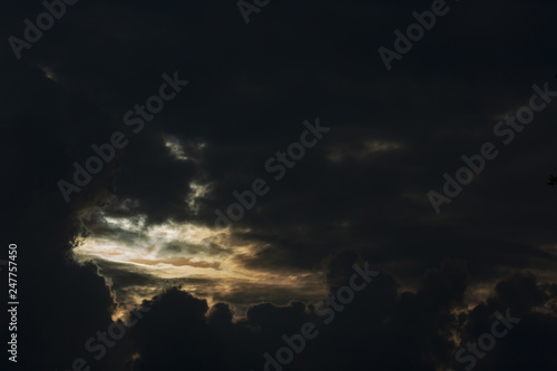 heaven light in dramatic sky with dark cloud