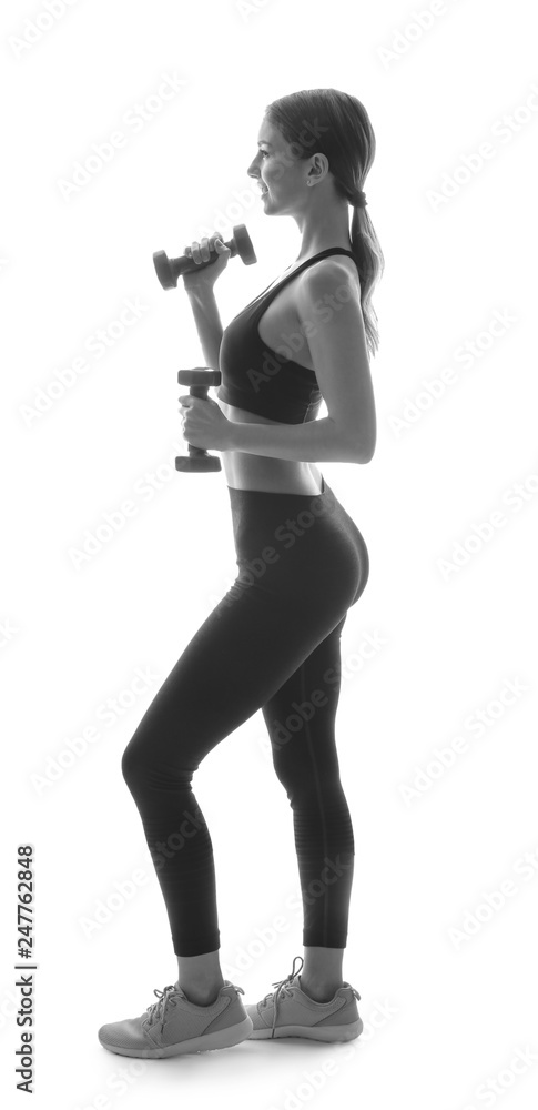 Portrait of sporty woman with dumbbells on white background Portrait of sporty woman with dumbbells on white background