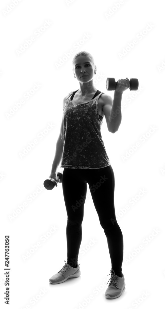 Portrait of sporty woman with dumbbells on white background Portrait of sporty woman with dumbbells on white background