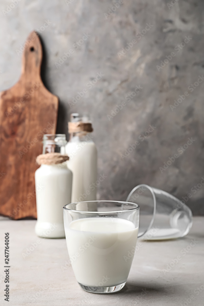 Glass of fresh milk on light table Glass of fresh milk on light table