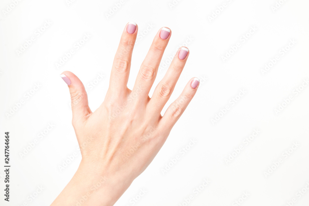 Closeup view of female hand. Woman shows 5 fingers, open palm, stop gesture. Horizontal color photography. Closeup view of female hand. Woman shows 5 fingers, open palm, stop gesture. Horizontal color photography.
