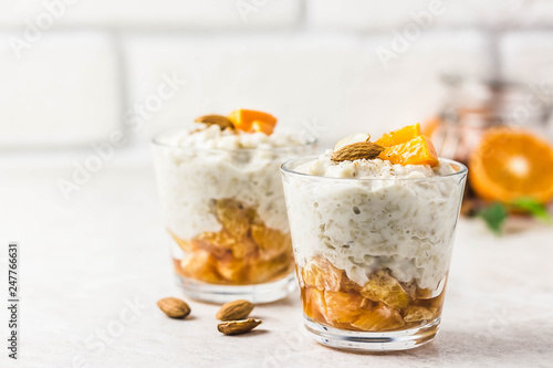 Overnight oats with citrus jam. Selective focus, space for text.