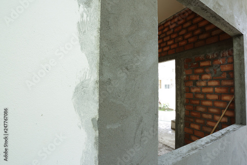 window frame on cement wall inside construction site building industry