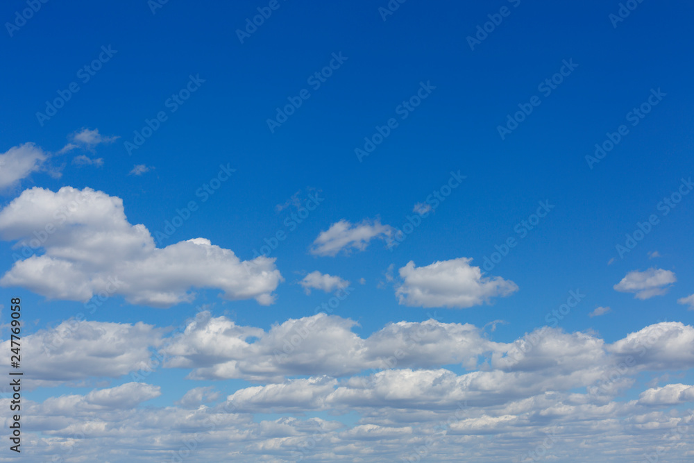 Blue sky background with clouds and copy space. Blue sky background with clouds and copy space.