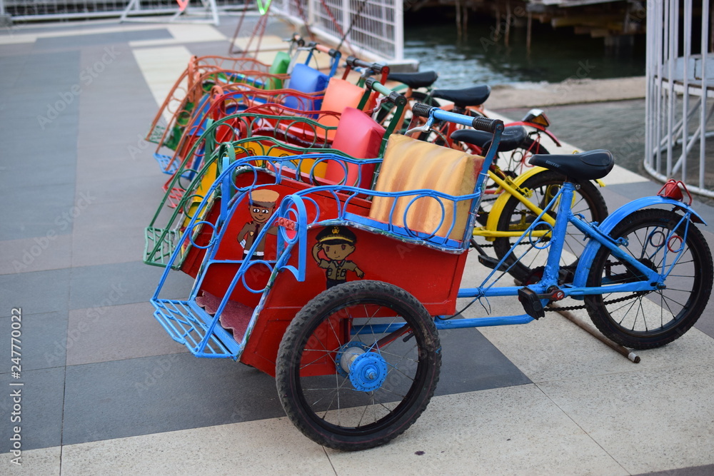 small rickshaws ,pedicab in playground