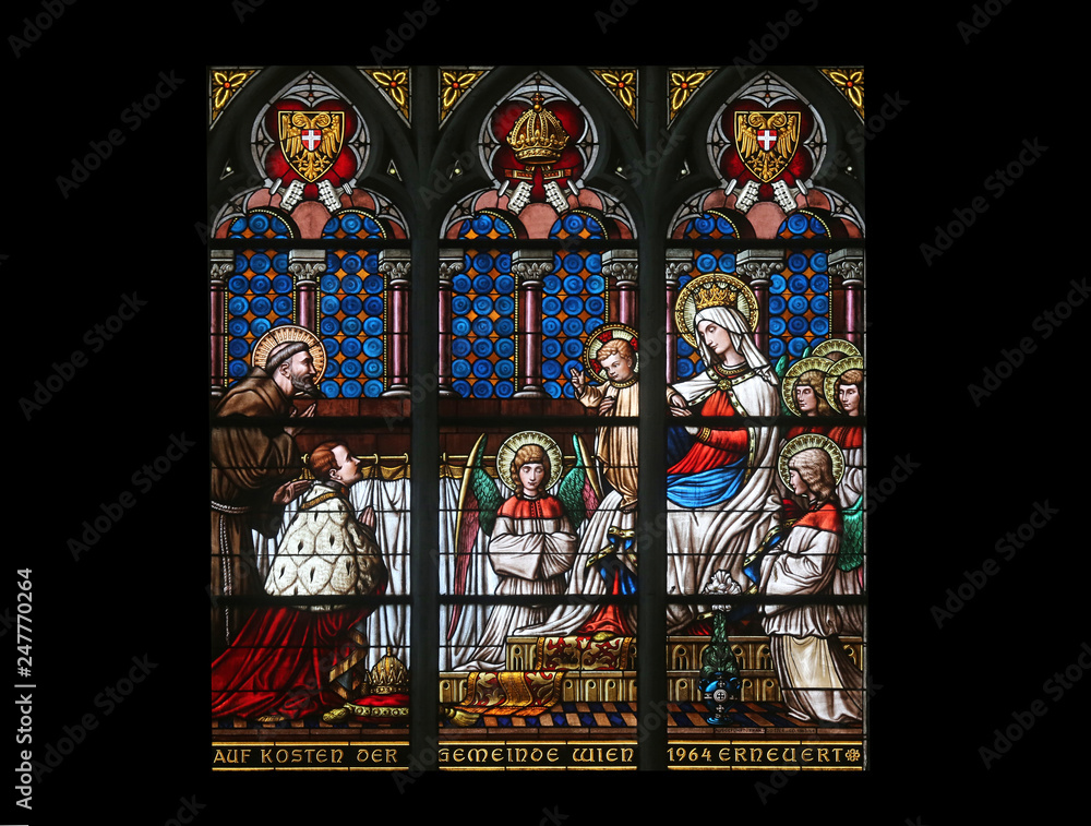 Φωτογραφία Virgin Mary with baby Jesus, angels and Saints, Stained glass in Votiv Kirche (T