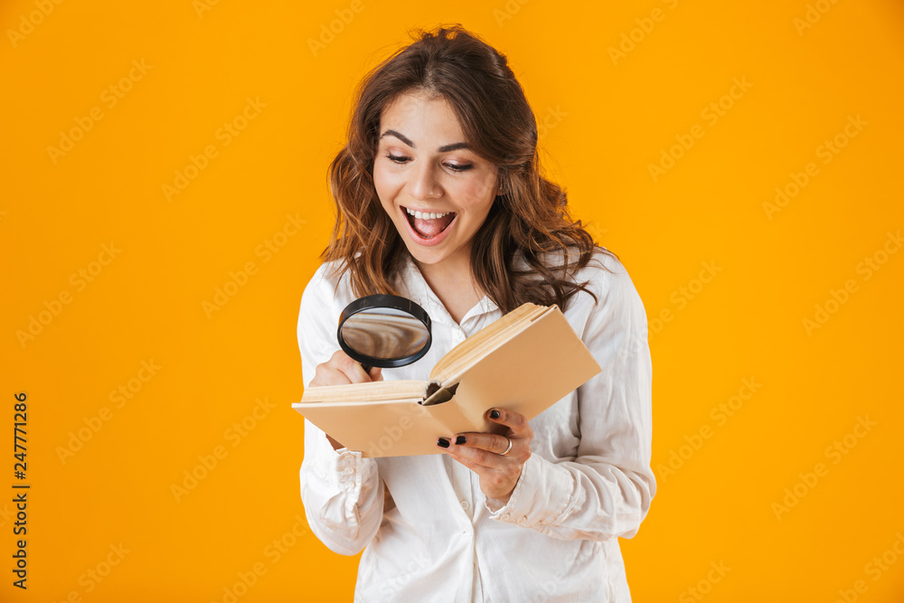 Fototapeta premium Cheerful young woman casualy dressed standing