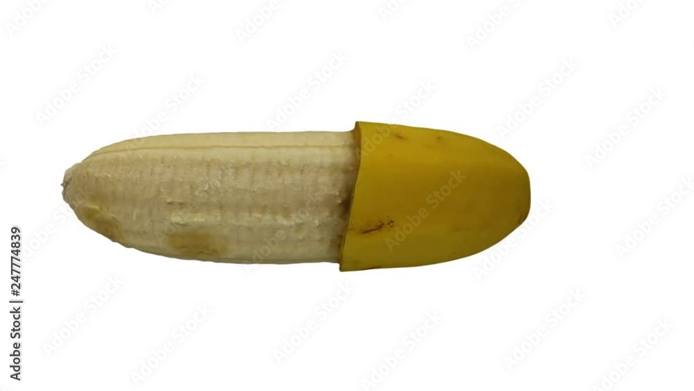 Realistic render of a rotating half peeled banana (Cavendish variety) on white background. The video is seamlessly looping, and the object is 3D scanned from a real banana. Realistic render of a rotating half peeled banana (Cavendish variety) on white background. The video is seamlessly looping, and the object is 3D scanned from a real banana.