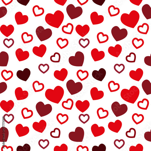 Simple hearts seamless vector pattern. Valentines day background. Flat design endless chaotic texture made of tiny heart silhouettes. Shades of red.
