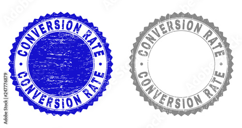Grunge CONVERSION RATE stamps isolated on a white background. Rosette seals with grunge texture in blue and grey colors. Vector rubber stamp imprint of CONVERSION RATE title inside round rosette.