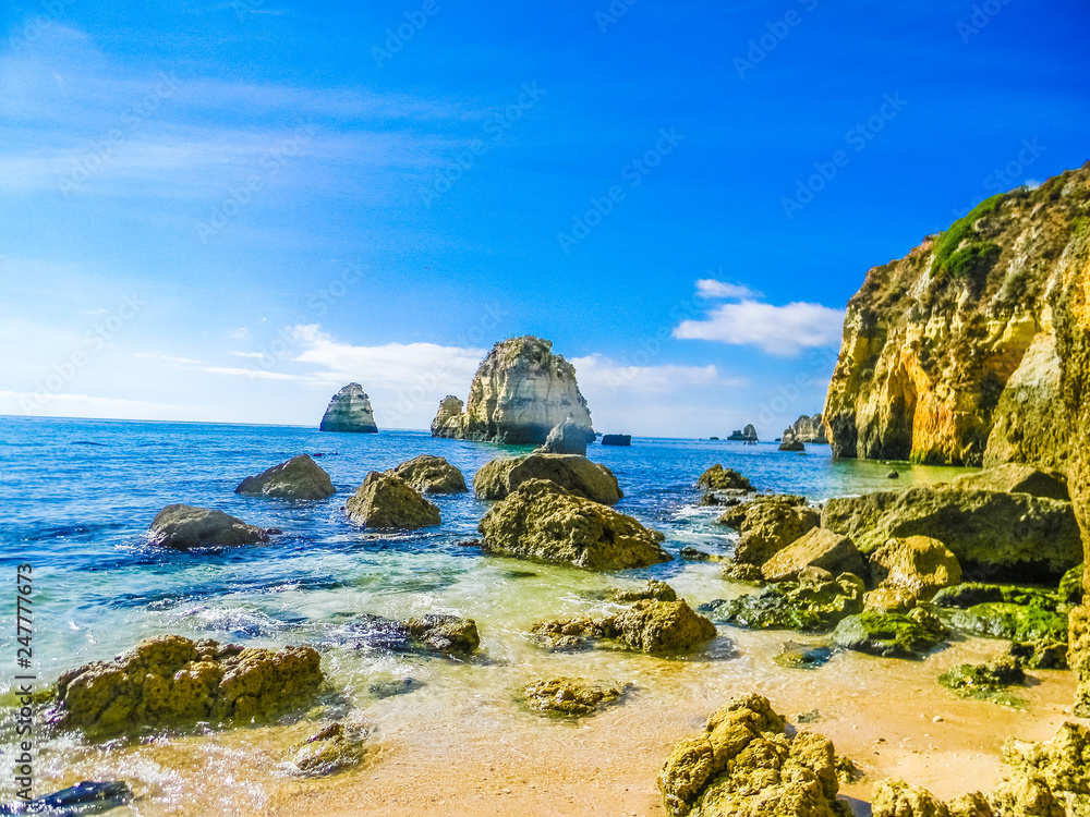 Rock formations in the beautiful beach of Praia Dona Ana, Lagos, Algarve, Portugal