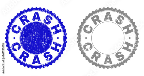 Grunge CRASH stamp seals isolated on a white background. Rosette seals with distress texture in blue and gray colors. Vector rubber stamp imprint of CRASH tag inside round rosette.