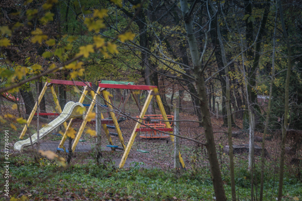 Rainy muddy children playground with cloudy day Rainy muddy children playground with cloudy day