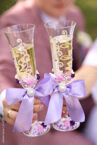 beautiful wedding glasses with purple bows