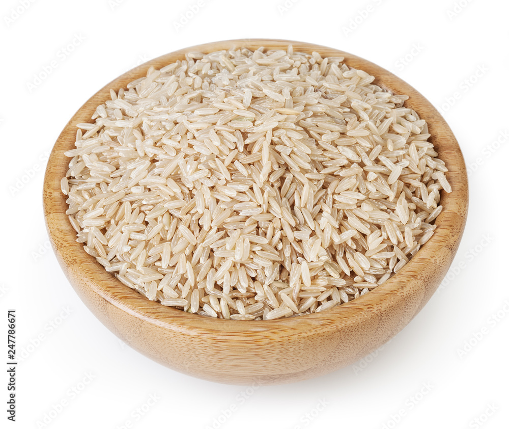 Brown rice in wooden bowl isolated on white background with clipping path