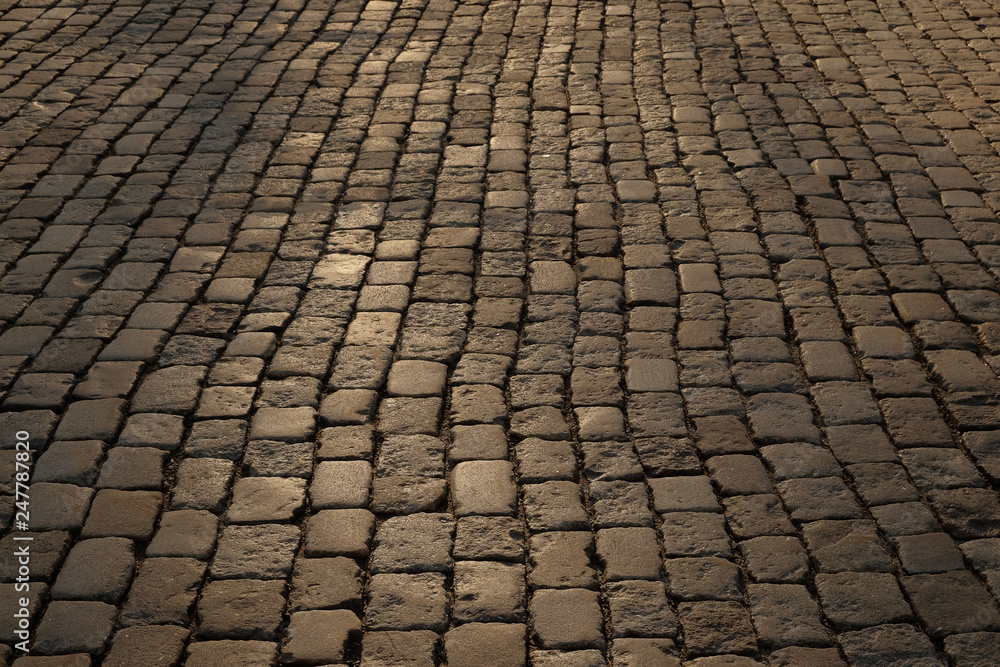 Street paved with gray large stones