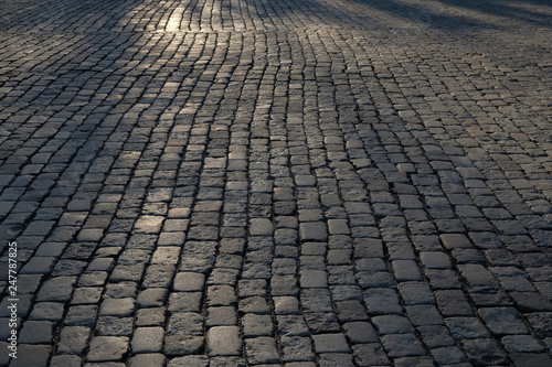 Canvas Print Road paved with gray large stones