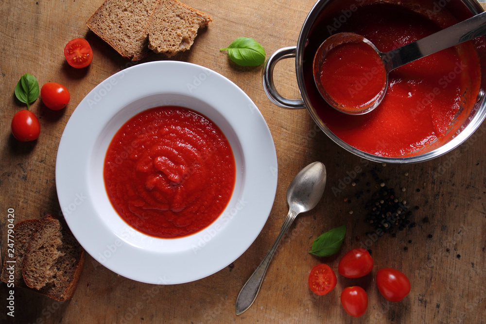 Traditional tomato soup with fresh herbs Traditional tomato soup with fresh herbs