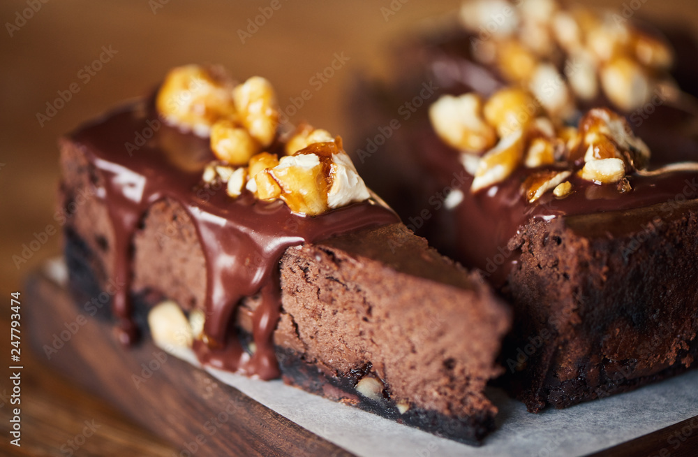 Delicious slice of chocolate cake sitting on a bakery table Delicious slice of chocolate cake sitting on a bakery table