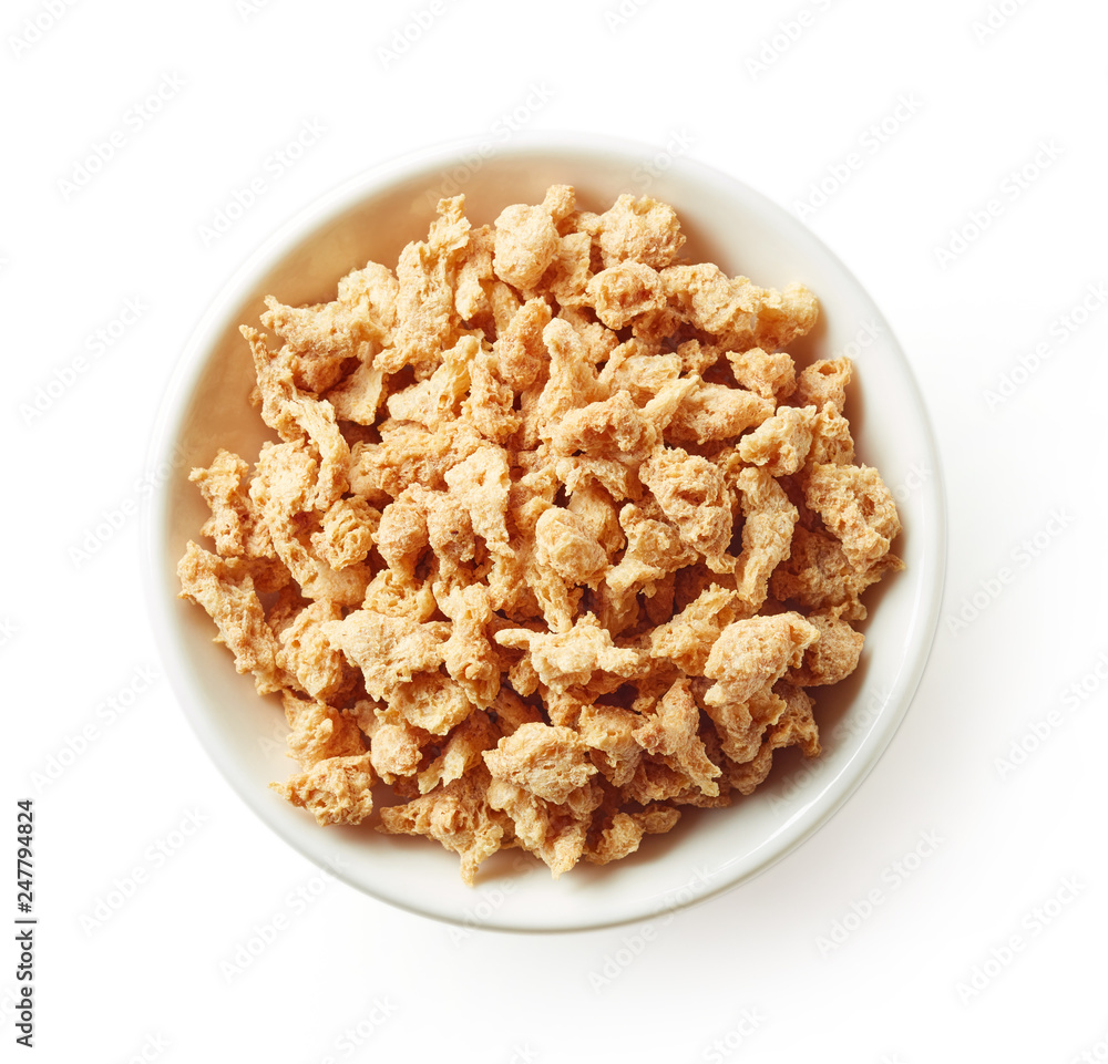 Bowl of soya chunks isolated on white, from above Bowl of soya chunks isolated on white, from above