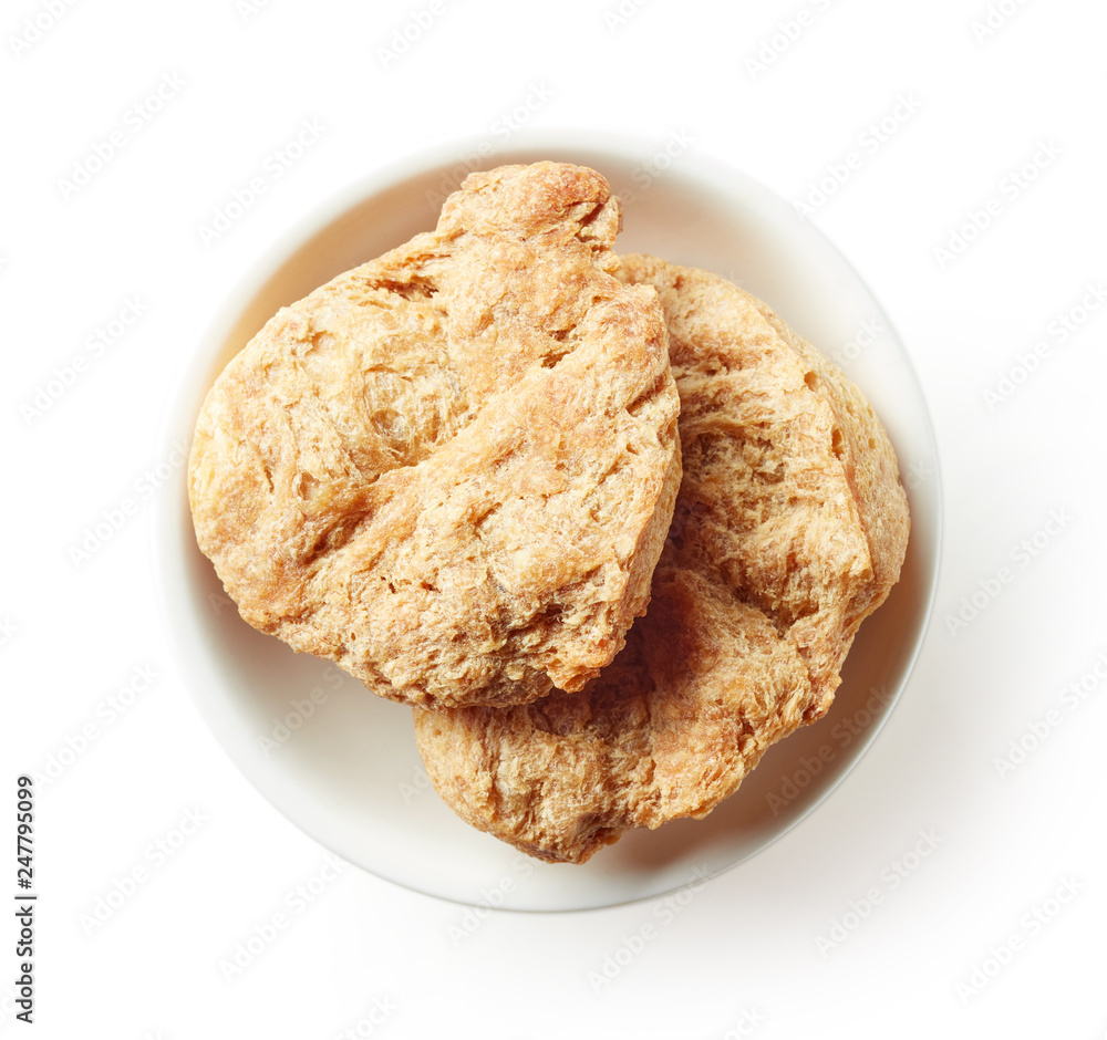 Bowl of soya chunks isolated on white, from above Bowl of soya chunks isolated on white, from above