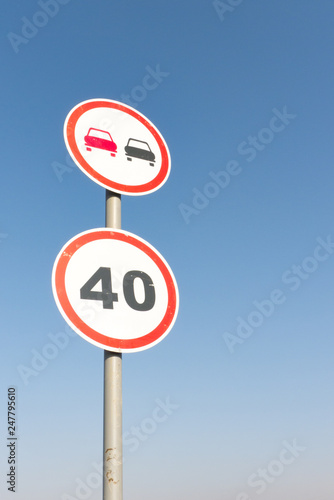 Speed limitation road sign. Overtaking prohibition road sign. Traffic sign.