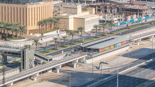 Aerial view of Dubai Tram in Dubai marina timelapse. © neiezhmakov