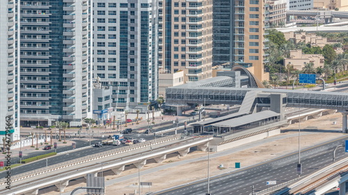 Aerial view of Dubai Tram in Dubai marina timelapse.
