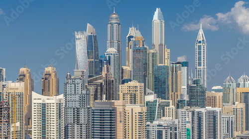 Dubai Marina skyscrapers aerial top view with clouds from JLT in Dubai timelapse  UAE.