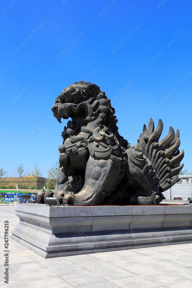 Lion sculpture in a park